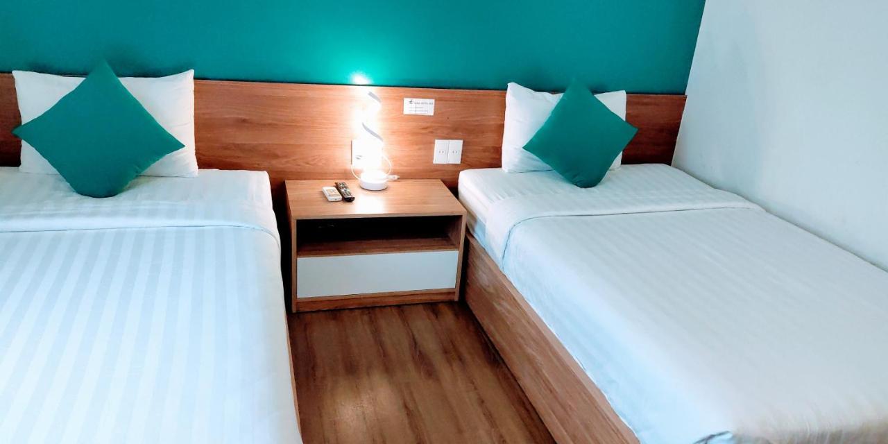Sing Hotel Дананг Экстерьер фото